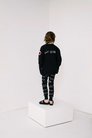 Black Journal Text Print Slim Pants