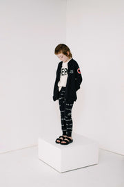 Black Journal Text Print Slim Pants