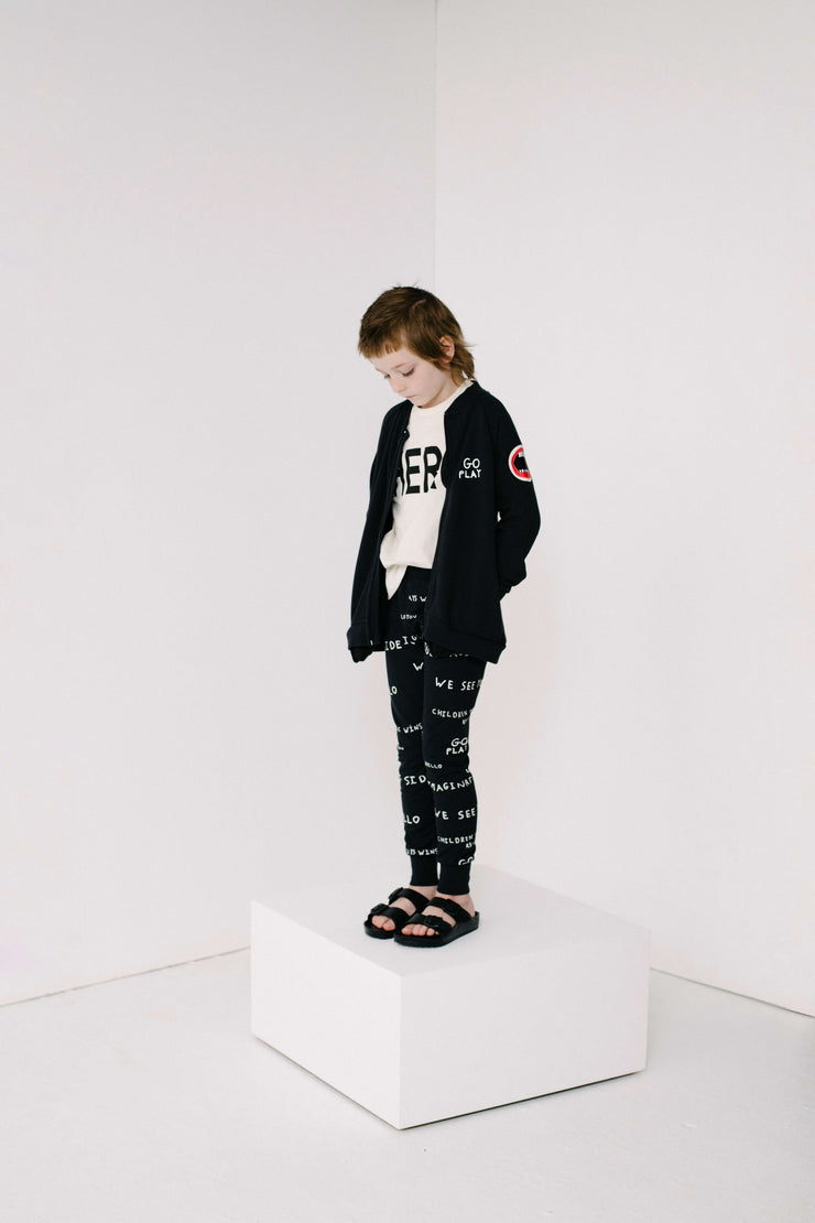 Black Journal Text Print Slim Pants